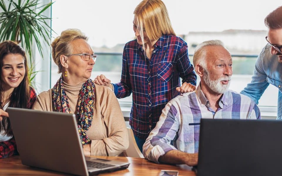 Young people assisting elderly neighbours